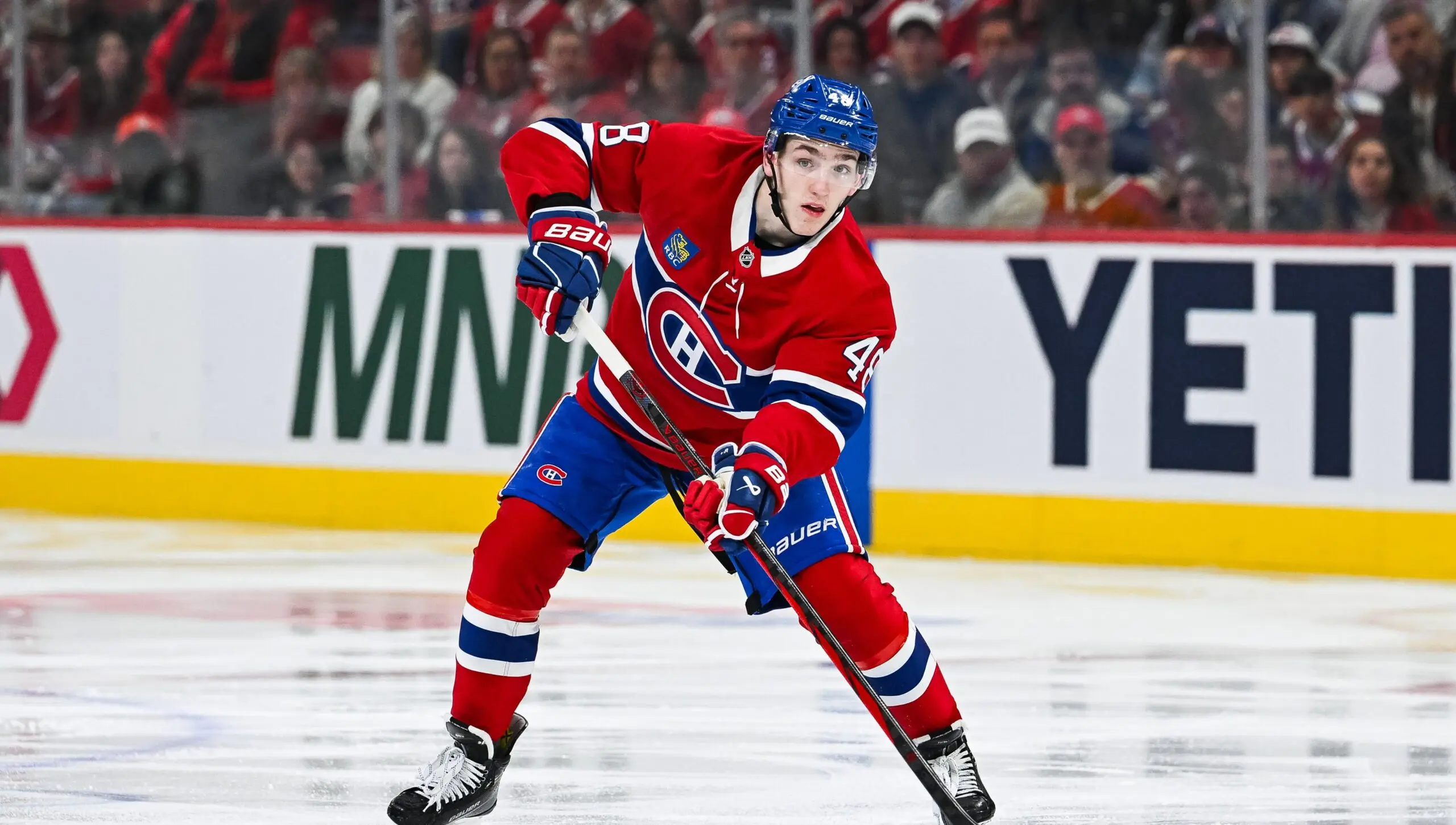 The Remarkable Journey of Lane Hutson in Hockey image 1
