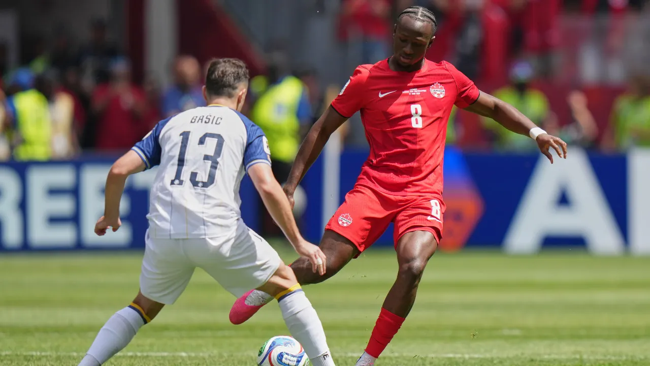 Canada's Ismael Kone plays a ball during the World Cup Group B soccer match between Canada and Bosnia. (Stephanie Scarbrough