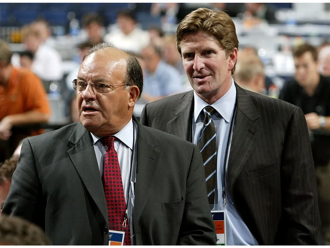 Scotty Bowman and Mike Babcock of the Detroit Red Wings work the Draft floor during the first round of the 2007 NHL Entry Draft at Nationwide Arena on June 22, 2007 in Columbus, Ohio.